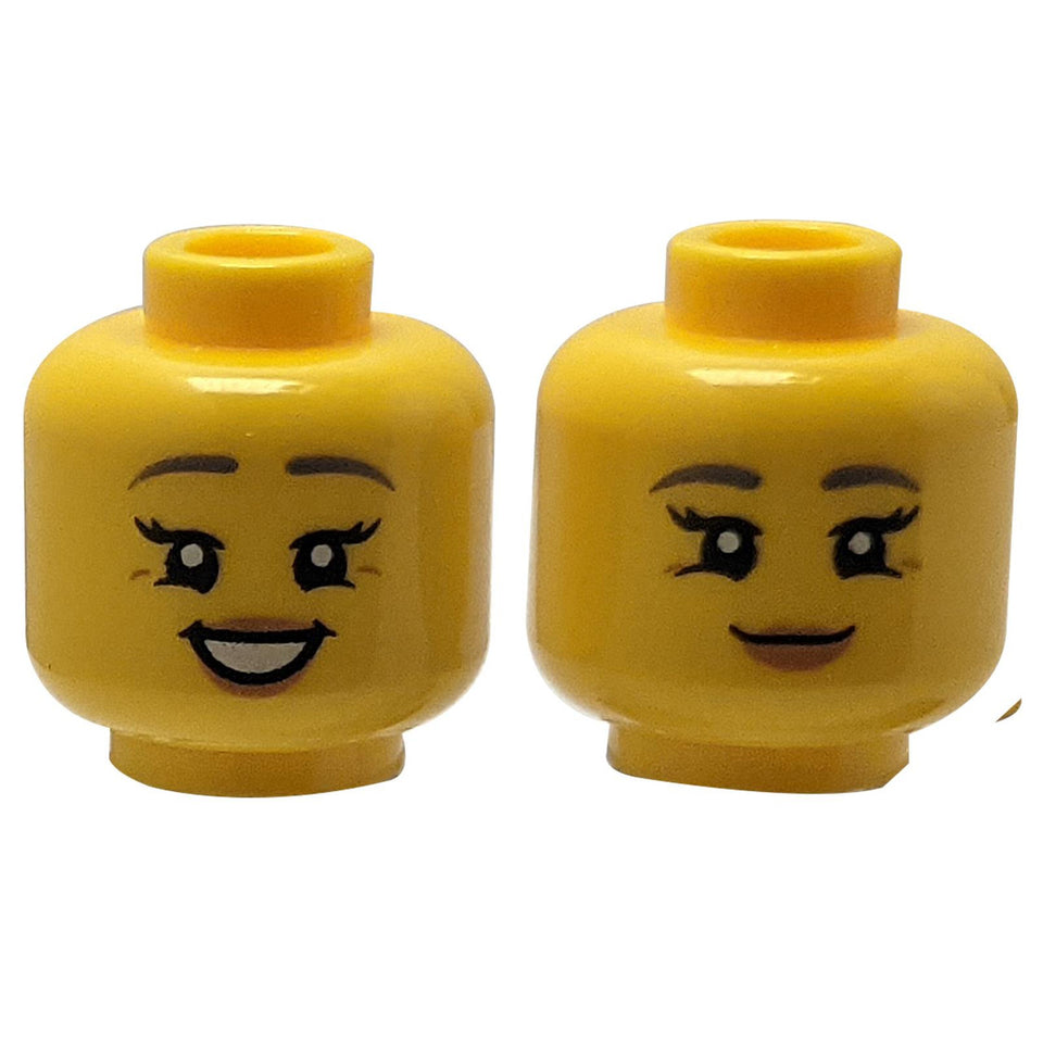 LEGO® female dual-sided minifigure head with two smiling expressions and medium nougat lips
