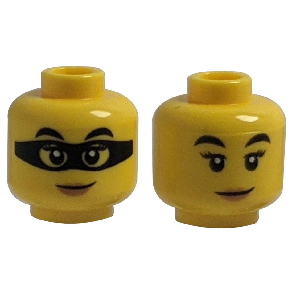 Dual-sided female LEGO head 3626pb2533 with smirk and black mask.