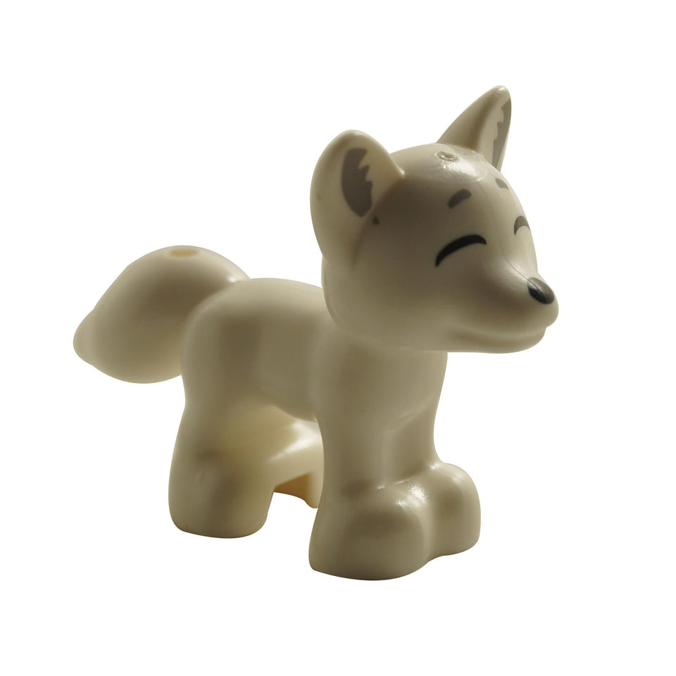White fox figure with closed smiling eyes, upright ears and raised tail