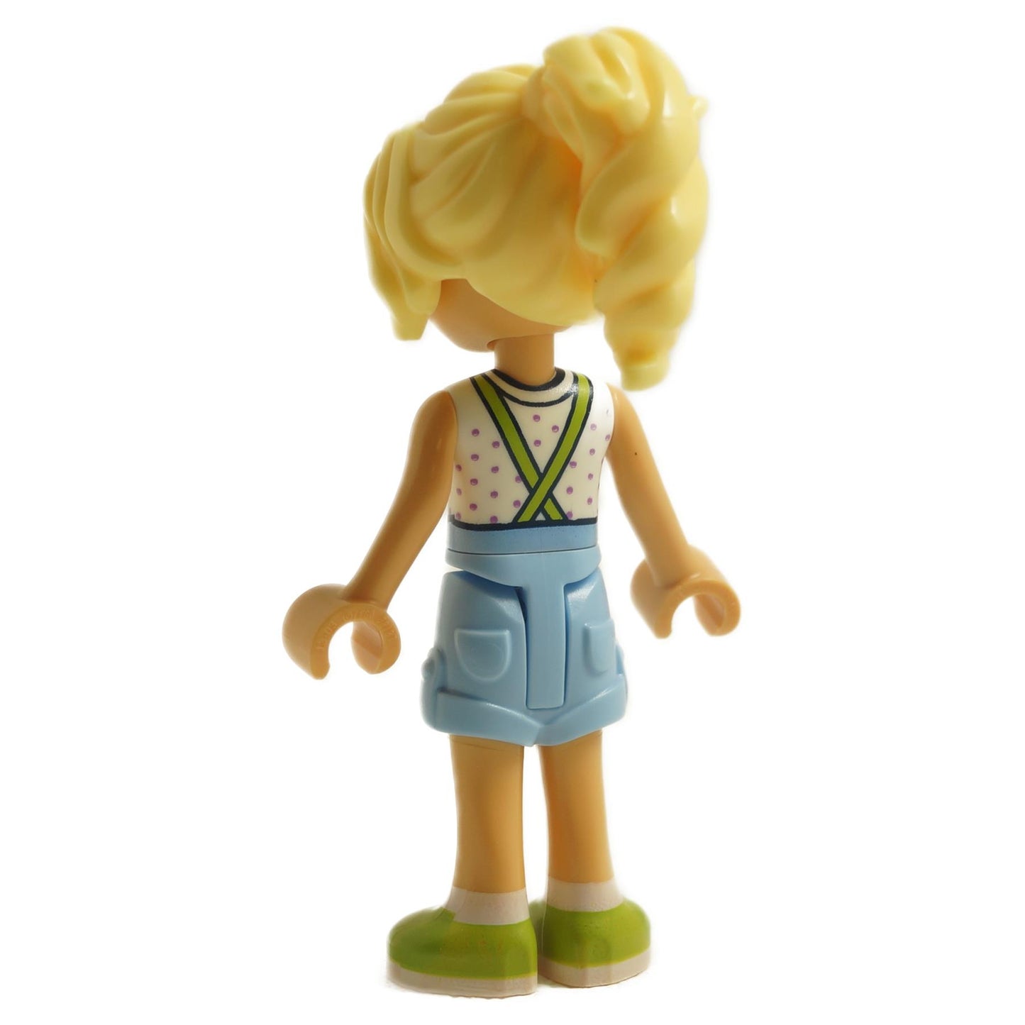 Back view of LEGO® Friends Kaya mini-doll frnd0685 with blonde hair, light blue overalls, and lime green shoes

