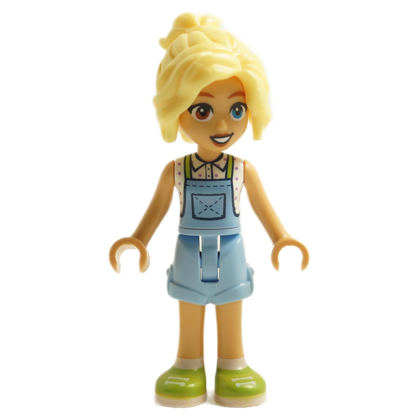LEGO Friends minifigure Kaya with light blue denim overalls, a polka-dot shirt, green shoes, and a stylish updo.