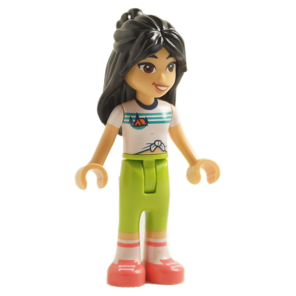 LEGO Friends Liann minifigure wearing a white knotted T-shirt with a camping design, bright green pants, and coral-colored sneakers.