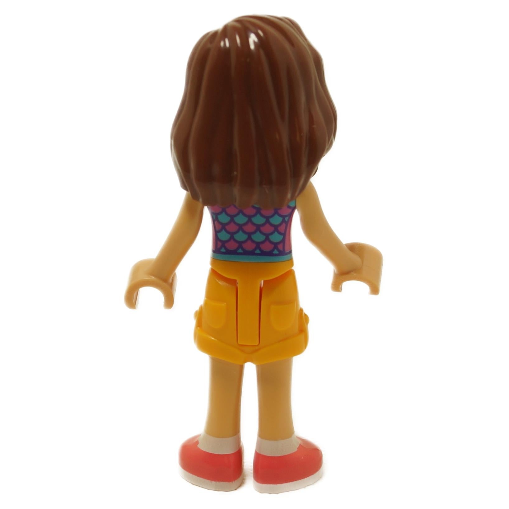 Back view of LEGO® Friends Luna mini-doll frnd637 with long brown hair, turquoise scale-pattern top and yellow skirt