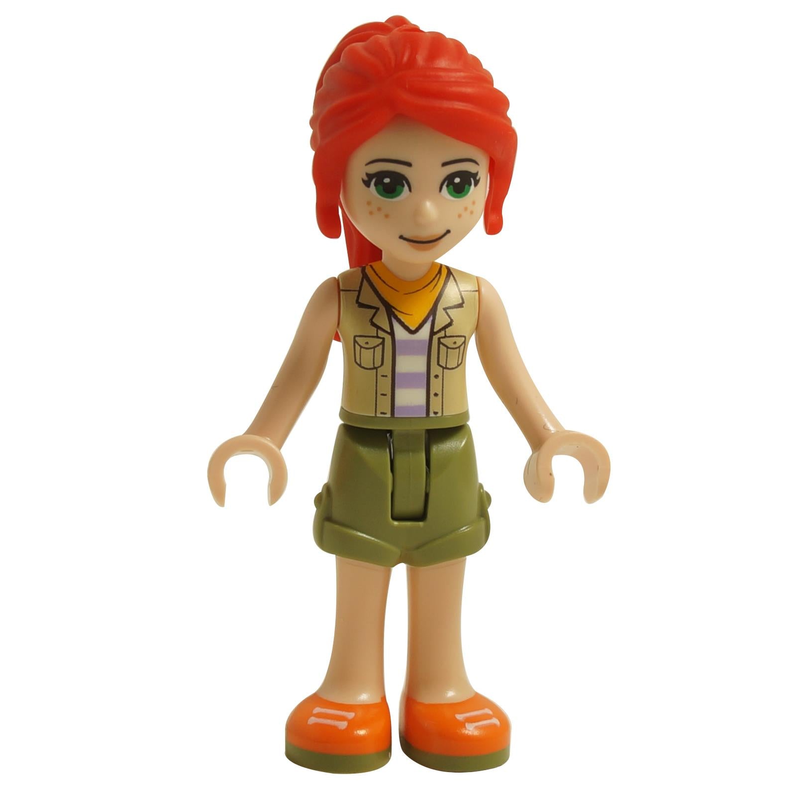 LEGO Friends Mia minifigure with red ponytail, wearing a safari-inspired outfit with olive green shorts, beige vest, and vibrant orange shoes.