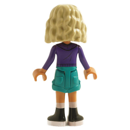 back view of LEGO Friends Nova mini doll with blonde hair wearing dark purple hoodie teal skirt and black shoes
