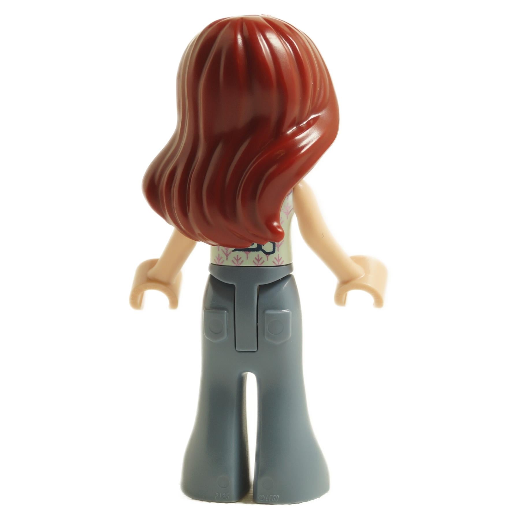 Back view of LEGO® Friends Paisley mini-doll frnd0627 with long reddish brown hair, light aqua vest, and gray flared pants
