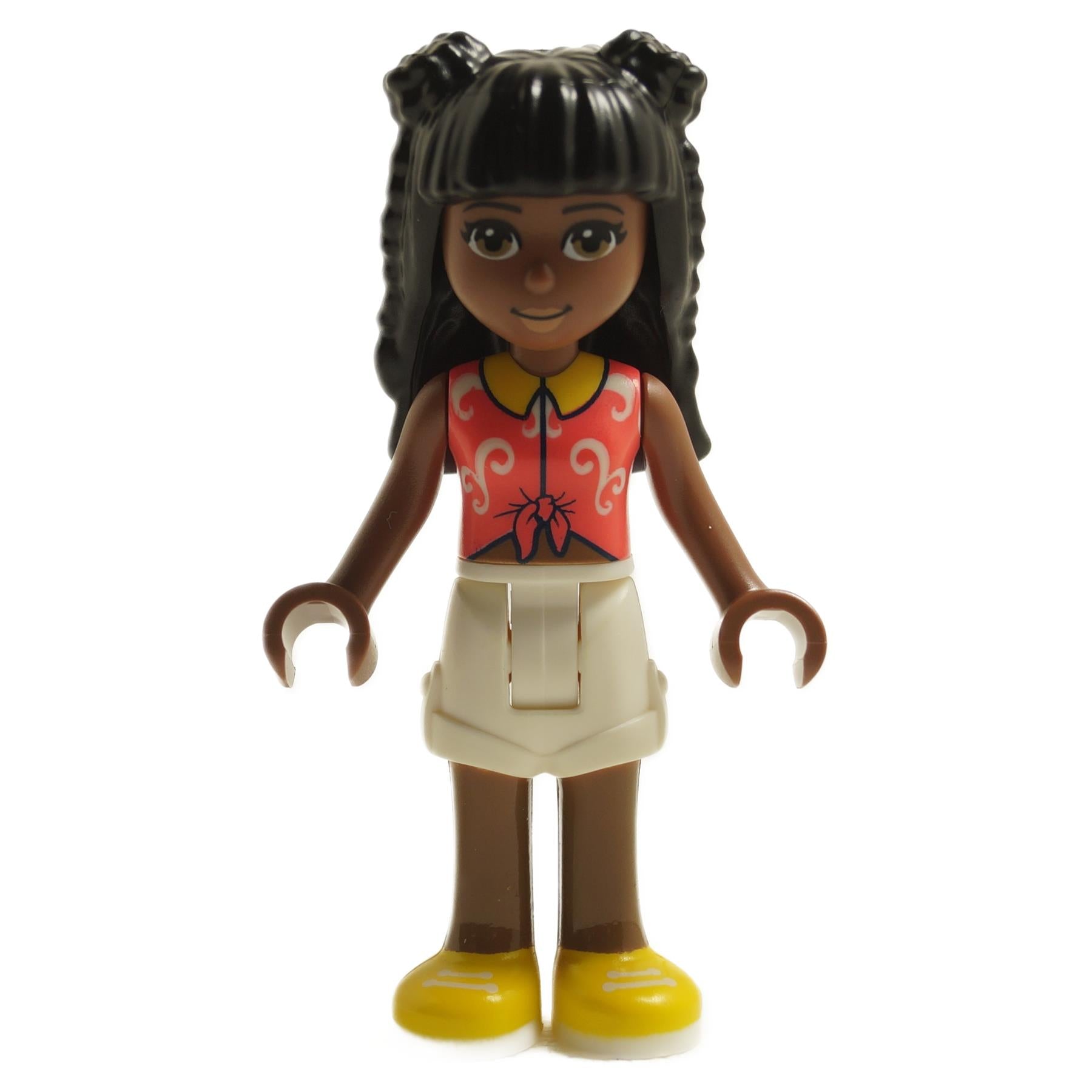LEGO Friends minifigure Priyanka, wearing a coral knotted blouse with white swirls, white shorts, and yellow shoes.