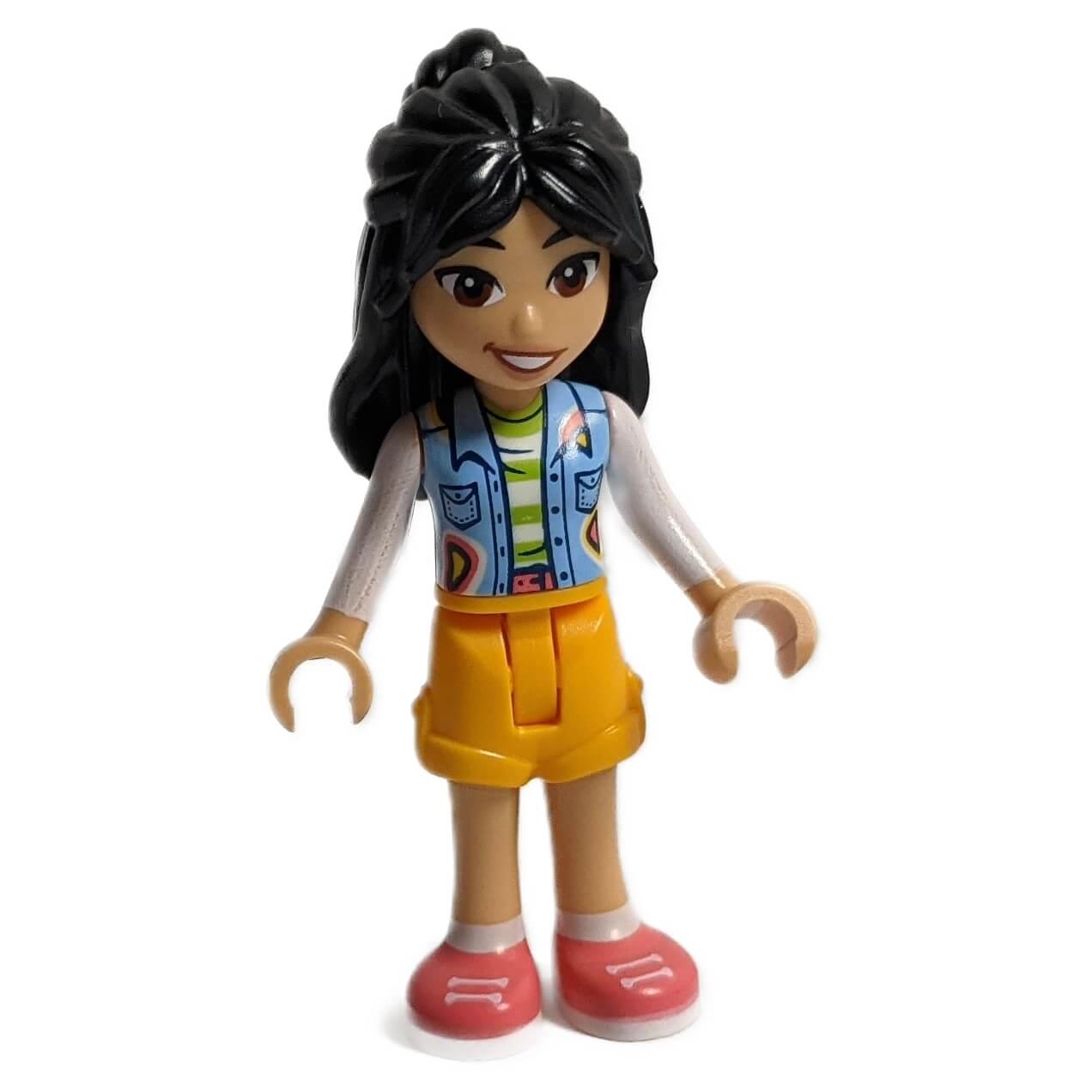 LEGO® Friends Liann minifigure with Bright Light Blue vest, Bright Light Orange shorts, and Coral shoes, perfect for Friends scenes and creative MOCs.