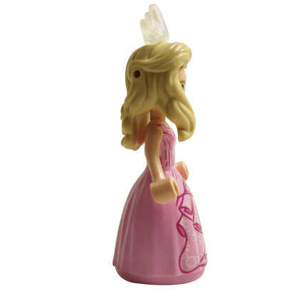 Side view of LEGO® Glinda mini-doll wck009 wearing a pink dress with long blonde hair and crown accessory
