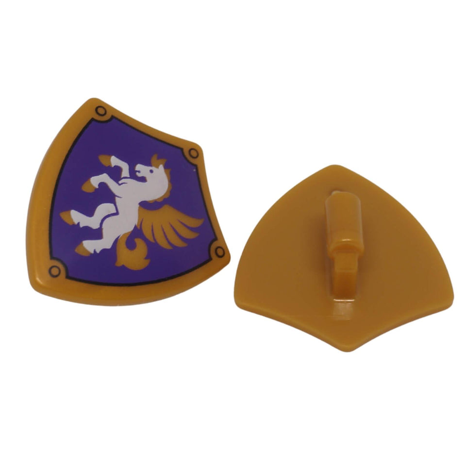 Gold-toned LEGO® minifigure shield 4972pb03 shown front and back with dark purple panel, white and gold Pegasus emblem and rear hand grip