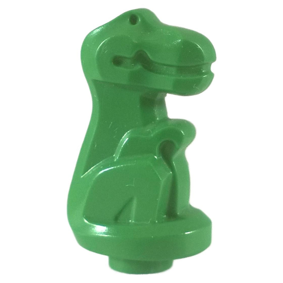 Grün Dinosaur-Babyfigur in sitzender Position.
