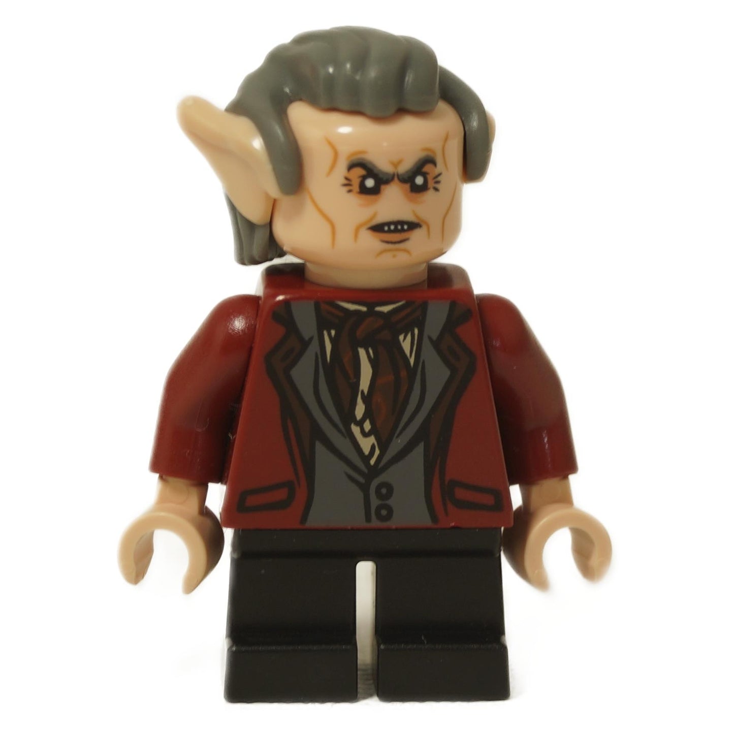 Minifigura de LEGO Harry Potter Griphook el goblin (hp138) con una chaqueta roja oscura y sonriendo, mostrada de frente.