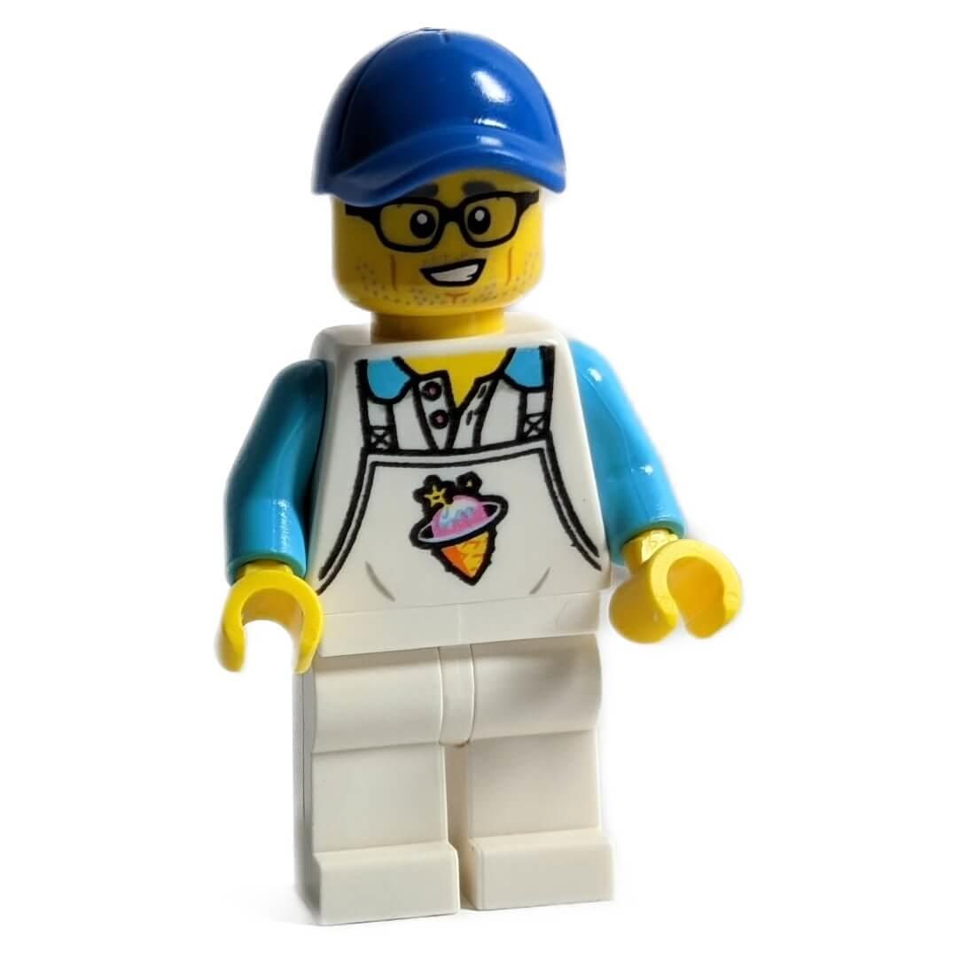 A LEGO minifigure named njo663 Hai, a friendly ice cream vendor wearing a blue cap, glasses, and a colorful apron with an ice cream planet logo.