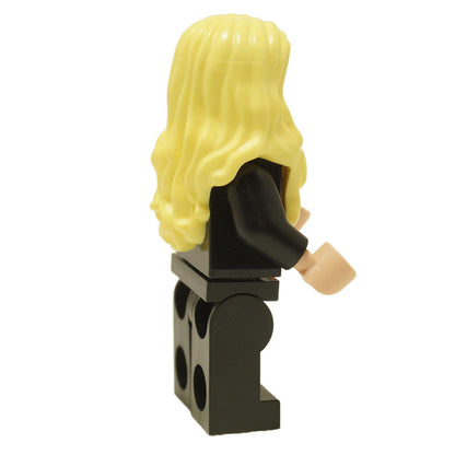 Side view of LEGO® Harry Potter Hannah Abbott minifigure hp407 wearing a black Hufflepuff robe and black legs
