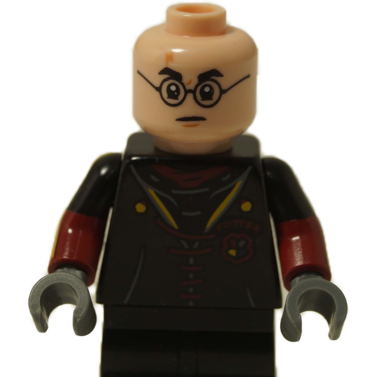Harry Potter minifigure Triwizard uniform with glasses and angry determined expression
