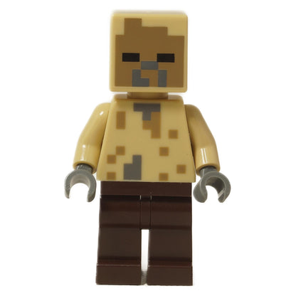 LEGO Minecraft Husk minifigure (min177) with a tan pixelated head and torso, and dark brown legs, representing the desert zombie mob.