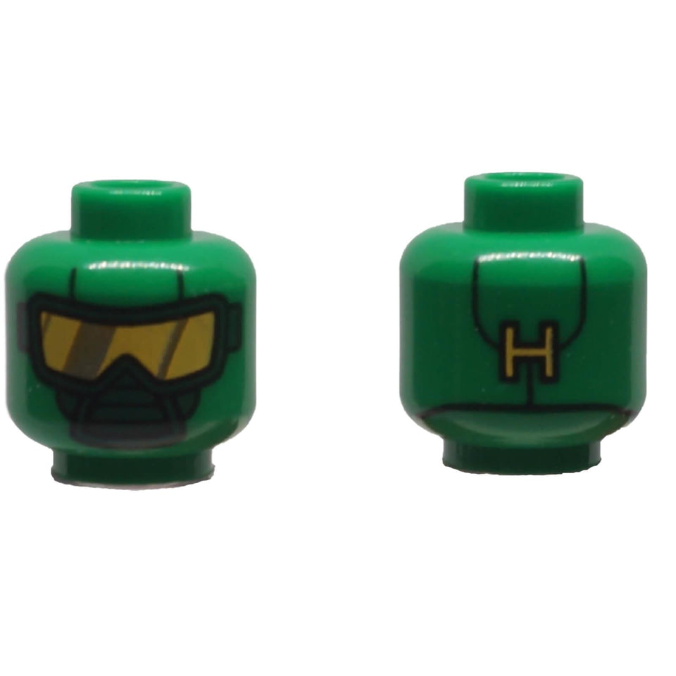 Green LEGO® Hydra Diver head 3626pb1452 shown front and back with black scuba mask, yellow goggles and H marking