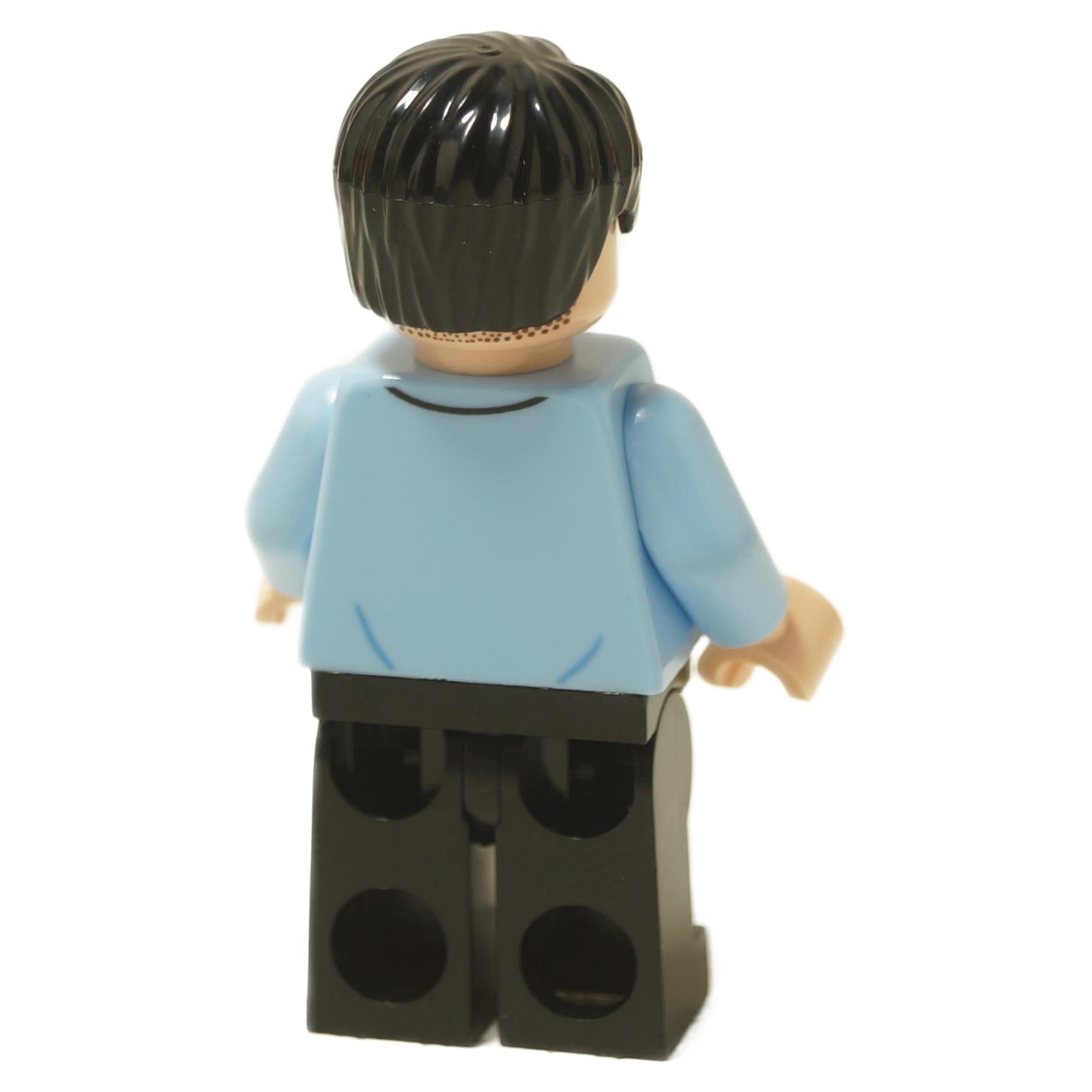 Back view of Ryan Howard minifigure with short dark hair, light blue shirt and black legs
