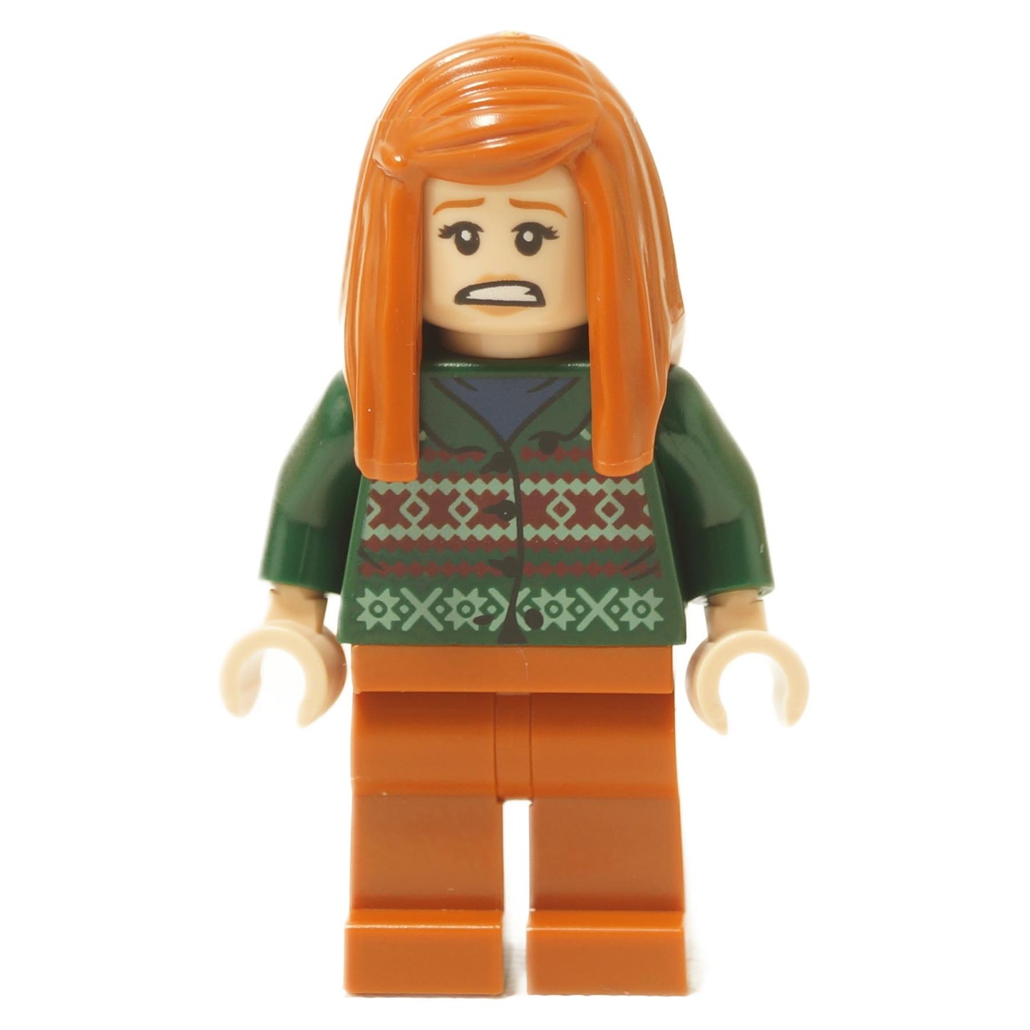 Meredith Palmer minifigure with long orange hair, green sweater pattern, orange legs and worried face expression
