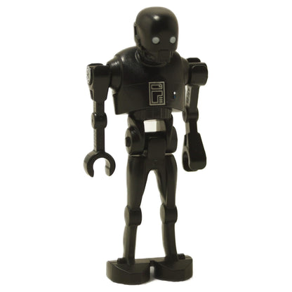 K-2SO droid minifigure front view in black with tall build, printed chest panel, and long limbs
