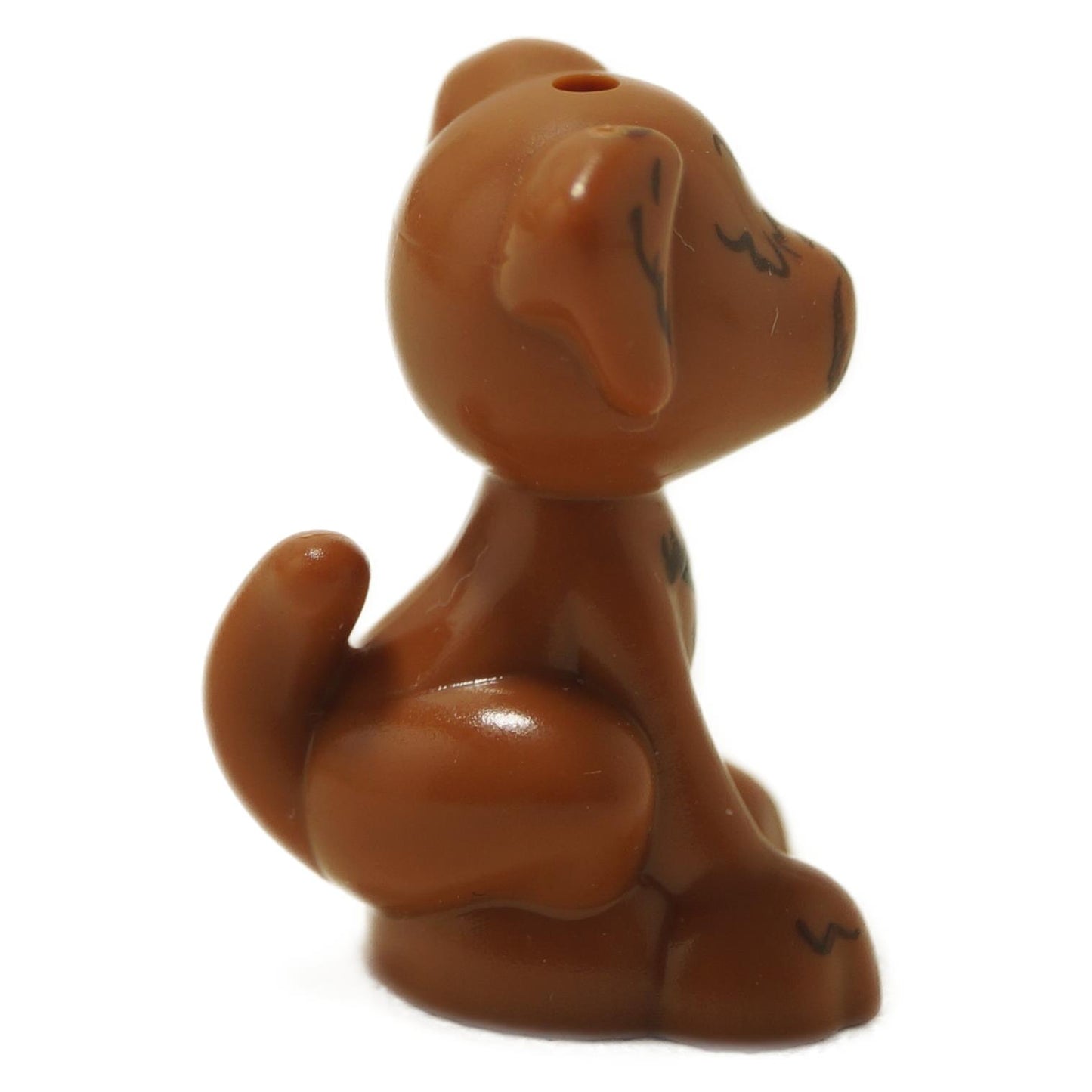 Labradoodle dog figure with pink collar and hair covering eyes, shown from side angle
