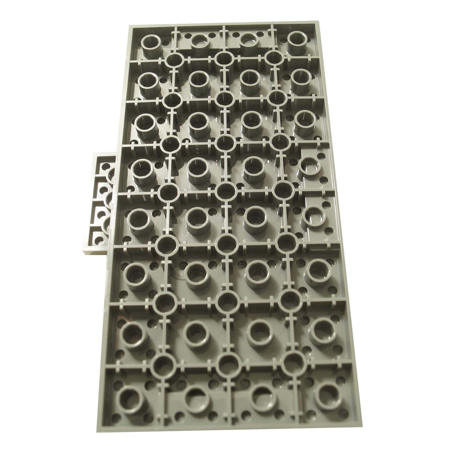 Brick Modified 8 x 16 x 2/3 with 1 x 4 Indentations and 1 x 4 Plate in light bluish gray – LEGO® part 18922, large structural panel used for bases and support. Back view.
