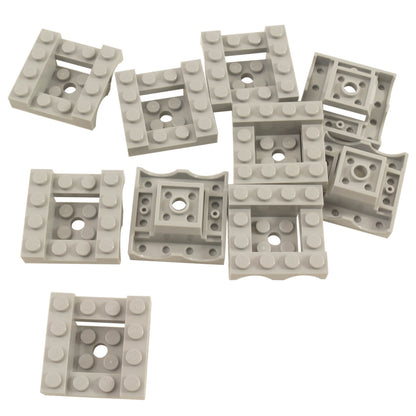 Ten light bluish gray LEGO® Part 24151 double vehicle mudguards with curved arch cutouts, central recesses and visible connection studs