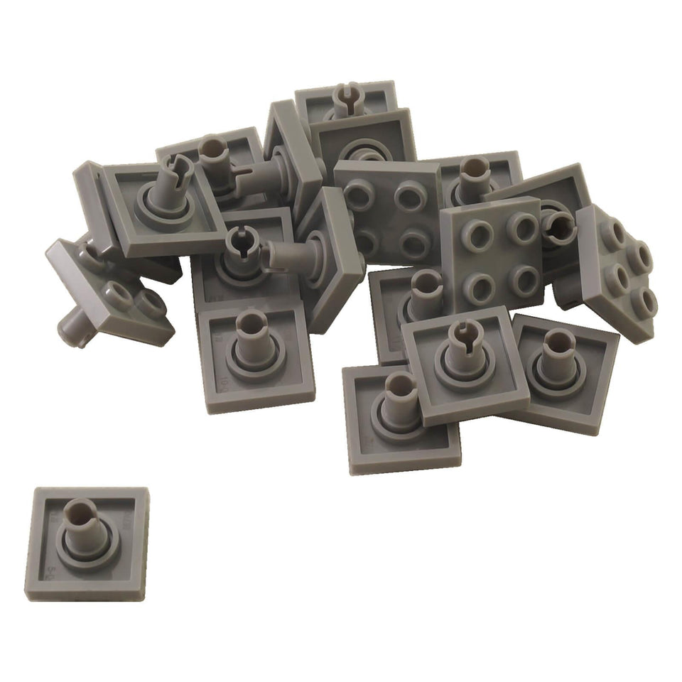 Light Bluish Gray LEGO 2476 modified 2 x 2 plates with pins on the bottom, shown in a group of 20 pieces