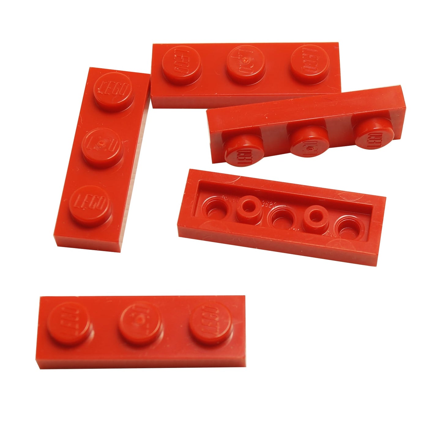 Plate 1 x 3 in red– LEGO® part 3623, classic 3-stud plate used for structural support and detailing
