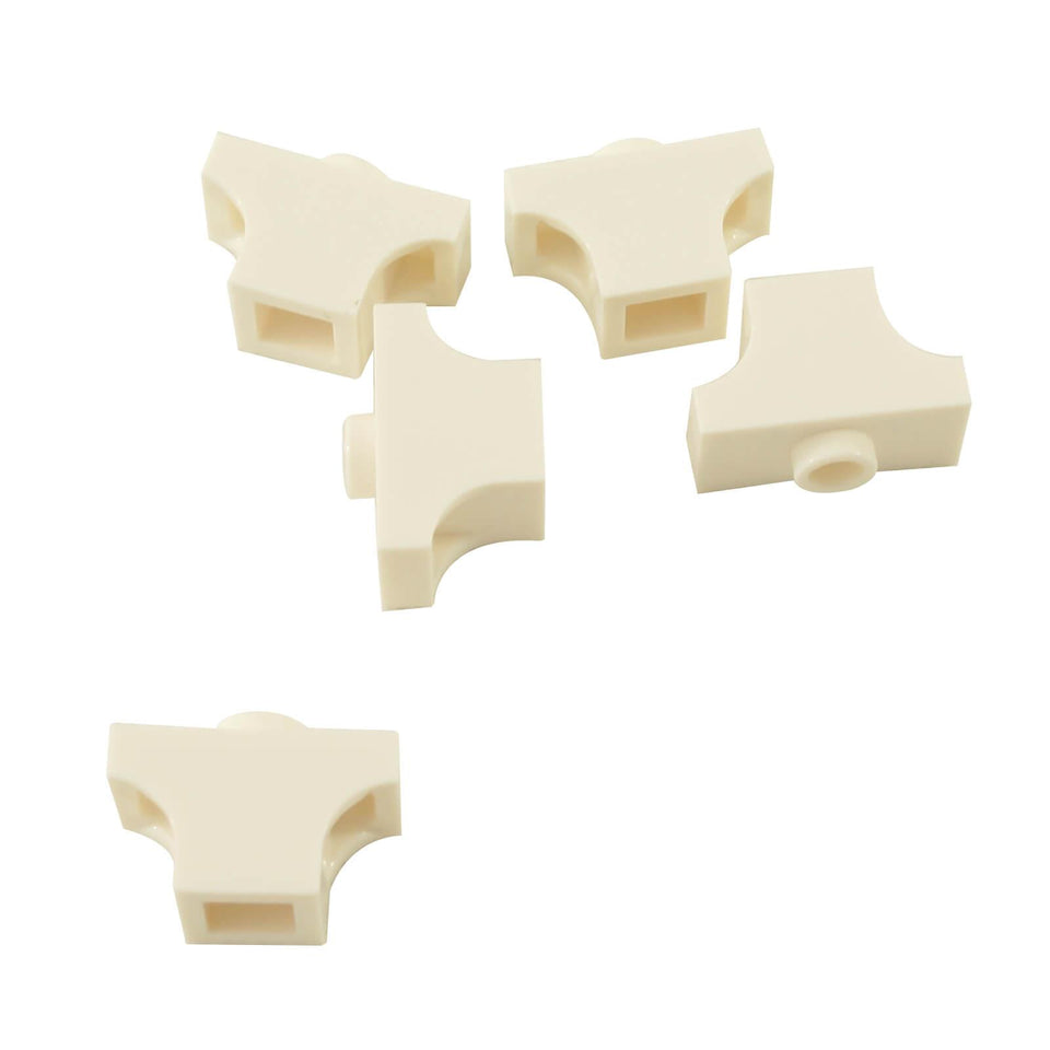 Five white LEGO® Arch 1 x 2 Inverted pieces, part 38583, showing curved side recesses and connection points