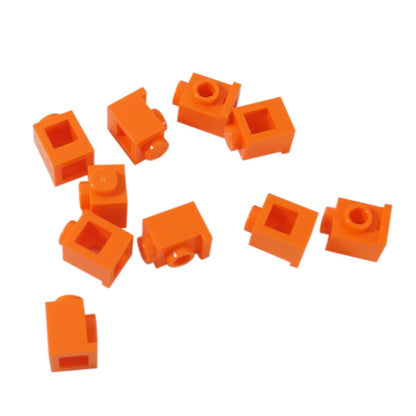Brick Modified 1 x 1 with Headlight in orange – LEGO® part 4070, classic stud-forward brick used for SNOT building
