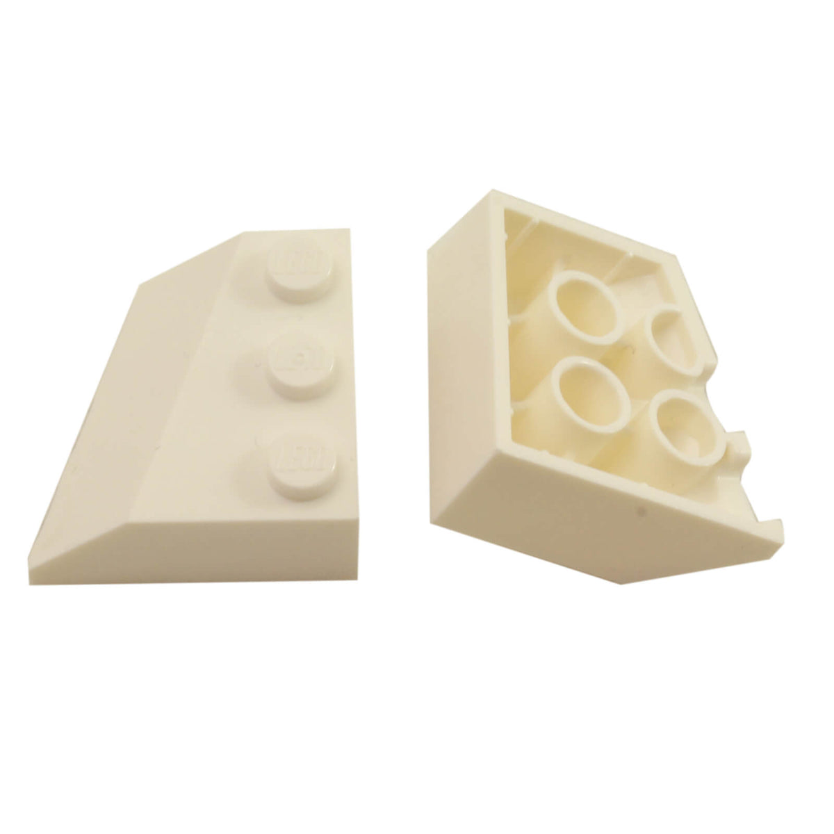 Two white LEGO® Part 42862 Wedge 3 x 3 Sloped Left bricks, showing the smooth angled top, three studs and underside connections