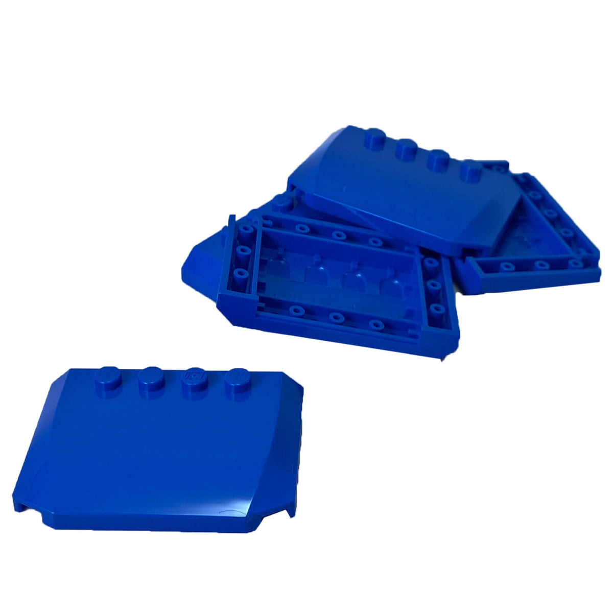 Blue LEGO® Part 52031 Wedge 4 x 6 x 2/3 Triple Curved with a smooth rounded surface, tapered profile and visible studs
