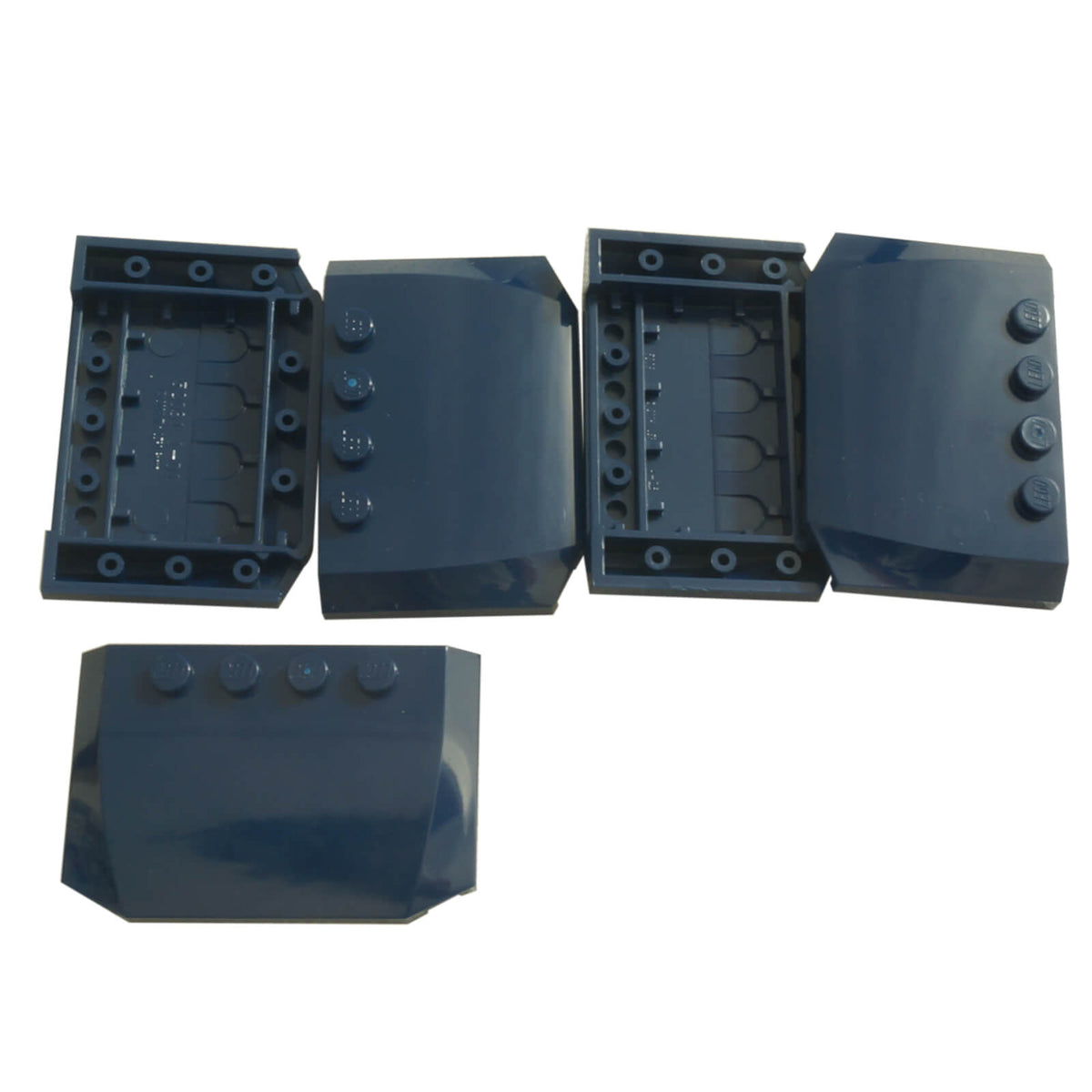Dark blue LEGO® Part 52031 Wedge 4 x 6 x 2/3 Triple Curved with a smooth rounded surface, tapered profile and visible studs