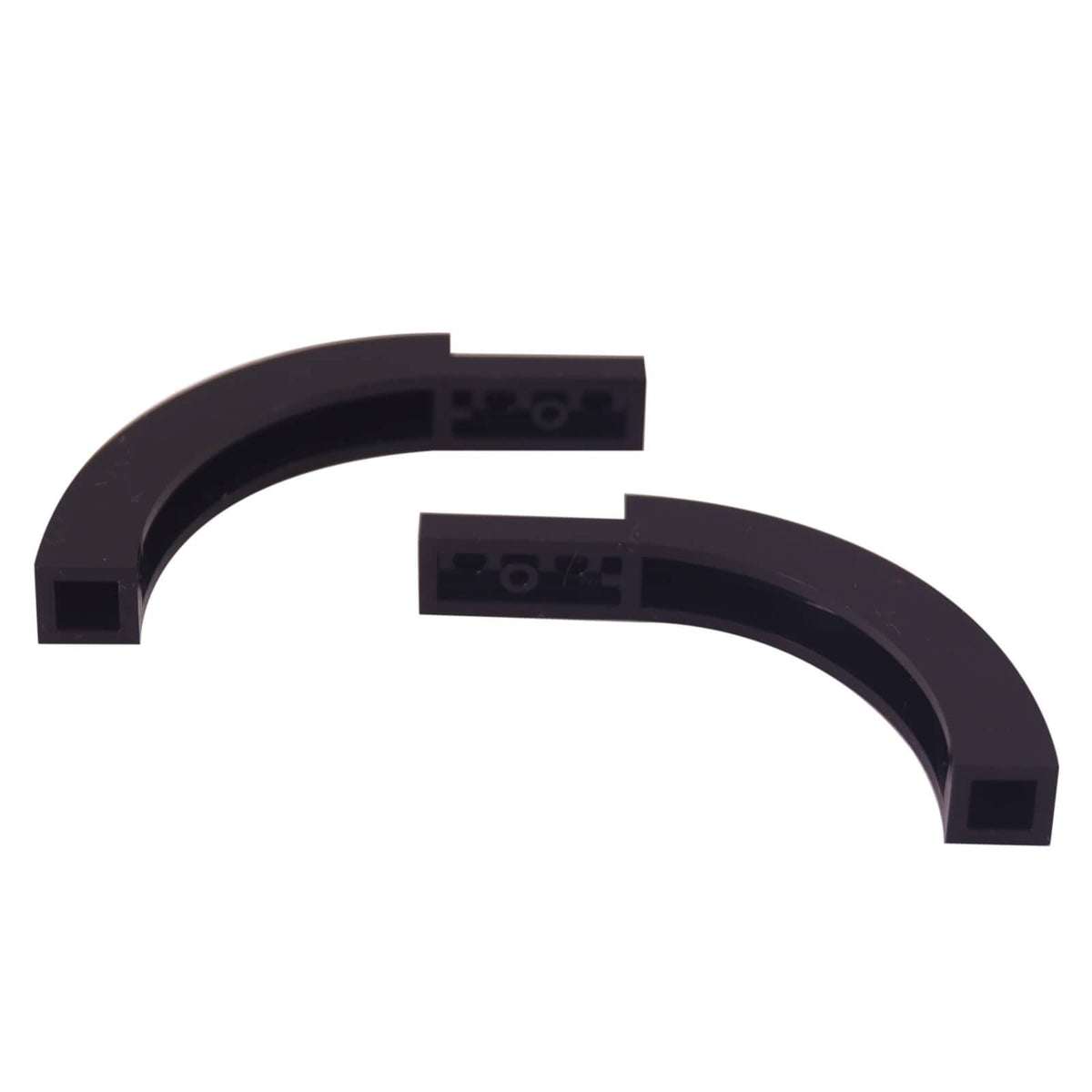 Two black LEGO® 6060 curved arch pieces showing their sweeping shape, open ends and underside connections.