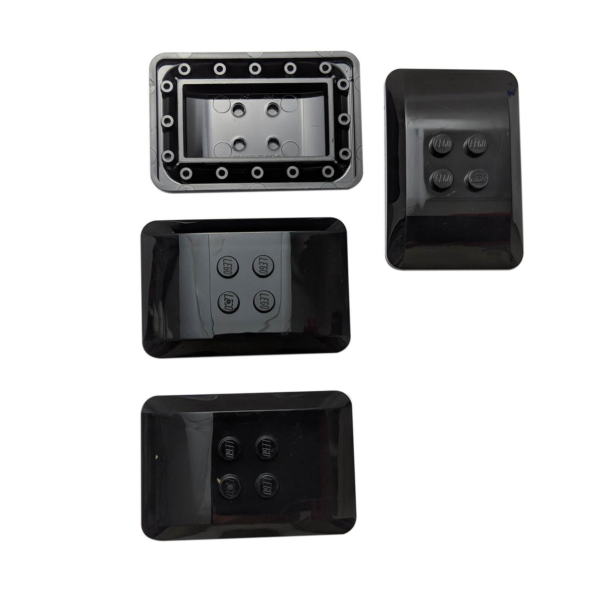Black LEGO® Part 98281 Wedge 6 x 4 x 2/3 Quad Curved with smooth rounded edges, low-profile shape and four visible studs