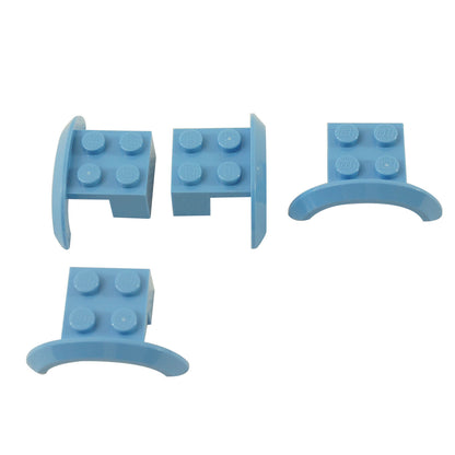 Four medium blue LEGO® Part 98282 vehicle mudguards featuring curved fender arches and four-stud mounting sections