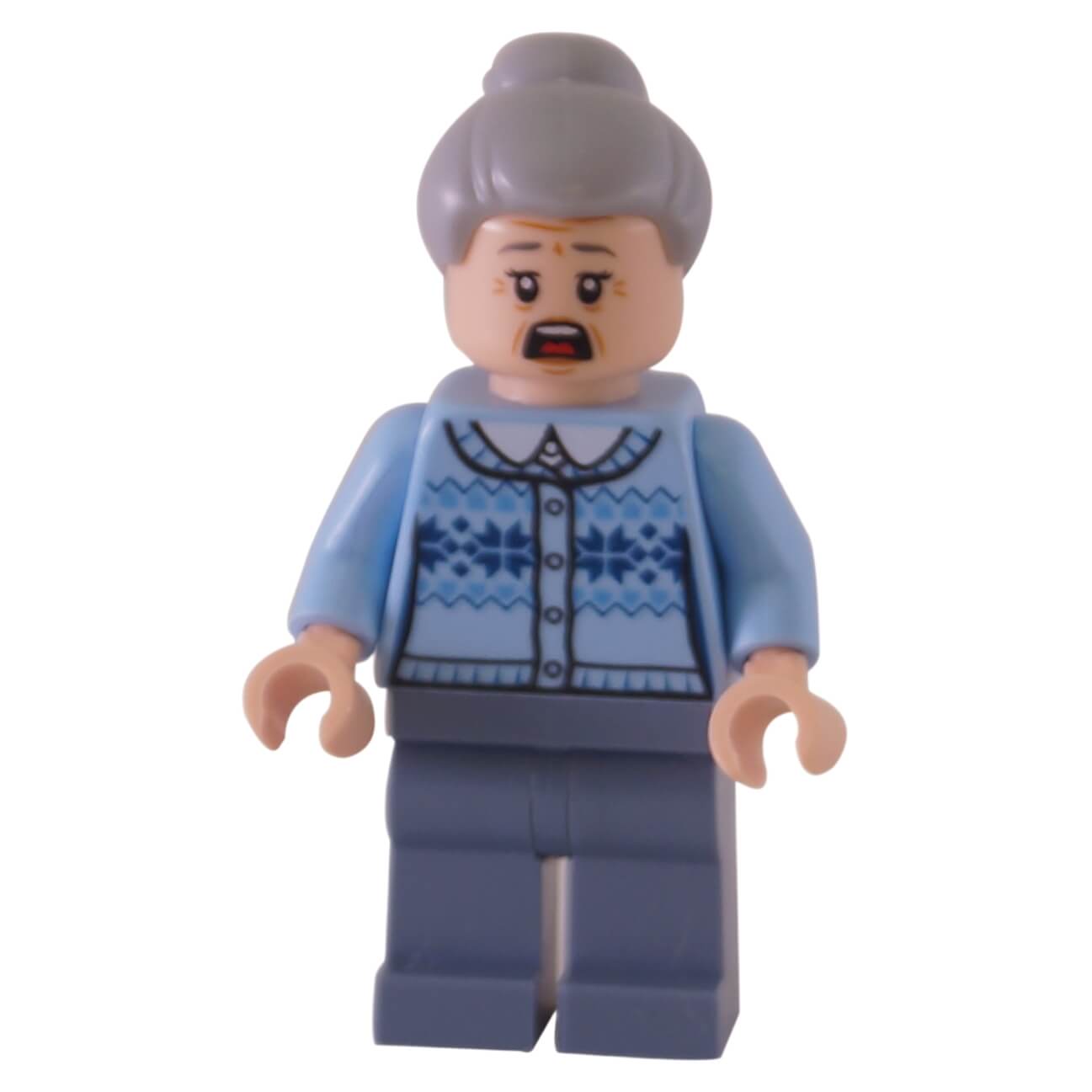 The LEGO Aunt May minifigure (sh544) with a scared expression, wearing a light blue fair isle sweater and with her gray hair in a bun.