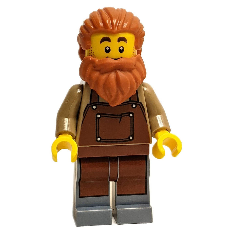 LEGO Blacksmith minifigure idea082 — dark orange wild hair and full beard, reddish brown bib apron print over dark tan torso, reddish brown legs, sand blue feet