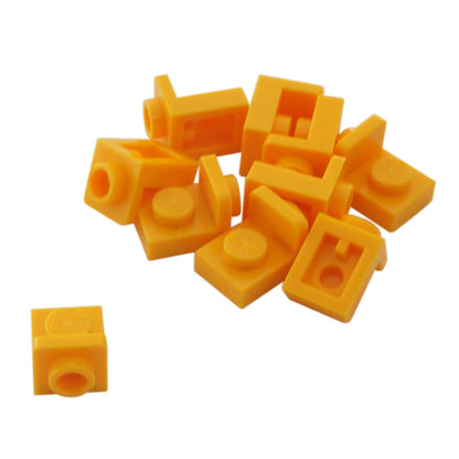 LEGO® Bracket 1 x 1 – 1 x 1 inverted in bright light orange, compact connector for SNOT building techniques.
