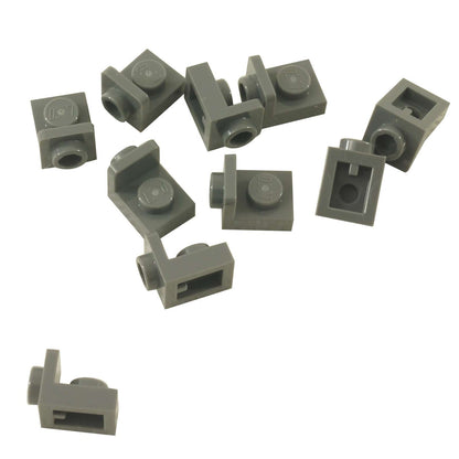 LEGO® Bracket 1 x 1 – 1 x 1 inverted in dark bluish gray, compact connector for SNOT building techniques.
