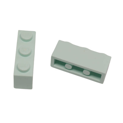 Lit aqua 1x3 brick building piece with three studs on top for minifigure scale builds
