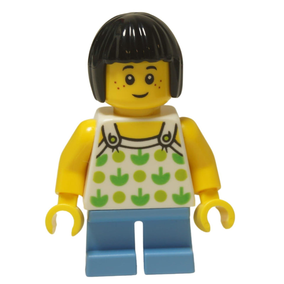 LEGO City child girl minifigure twn322 with green apple shirt and short legs.