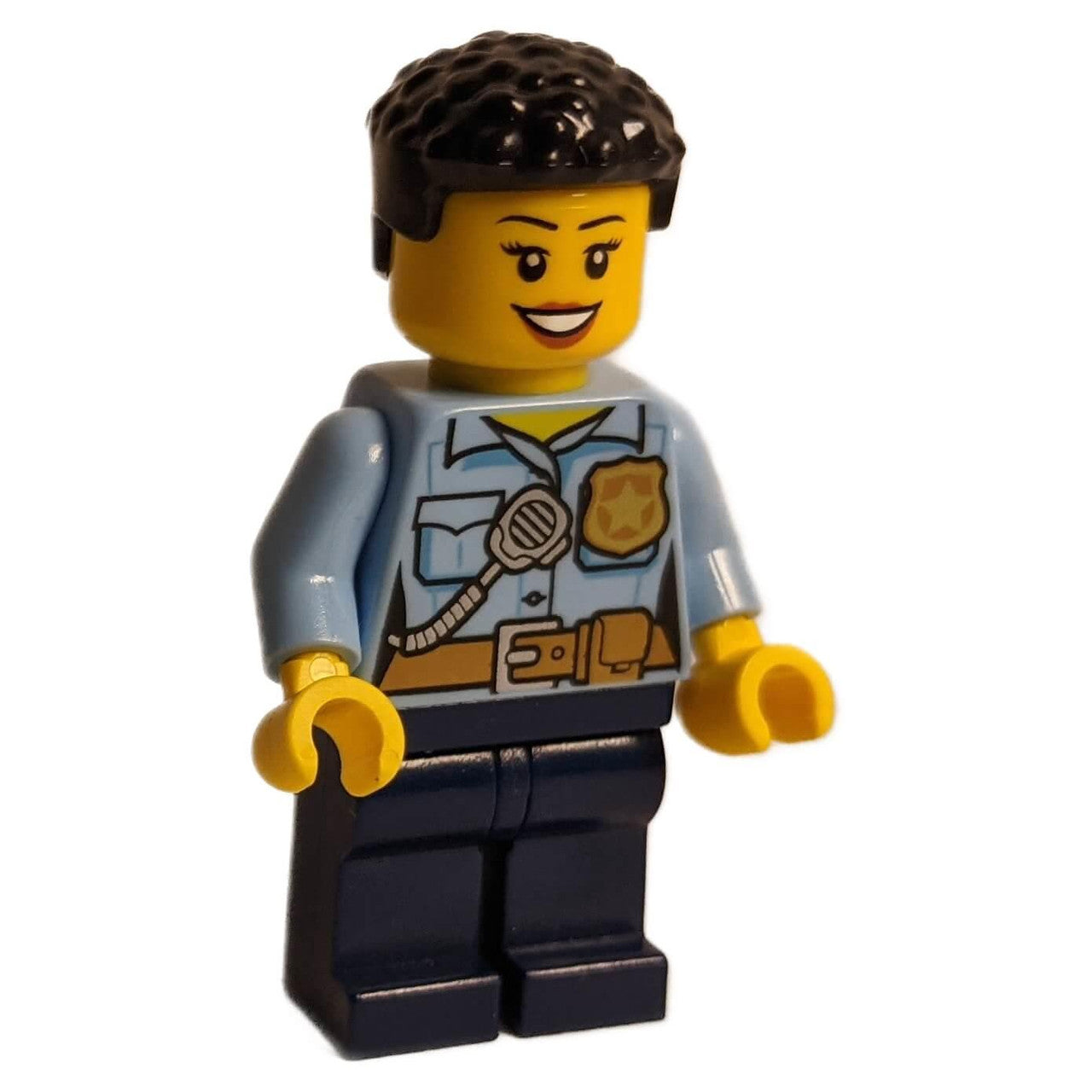 LEGO City female police officer cty1381 with badge, radio, and short hair.