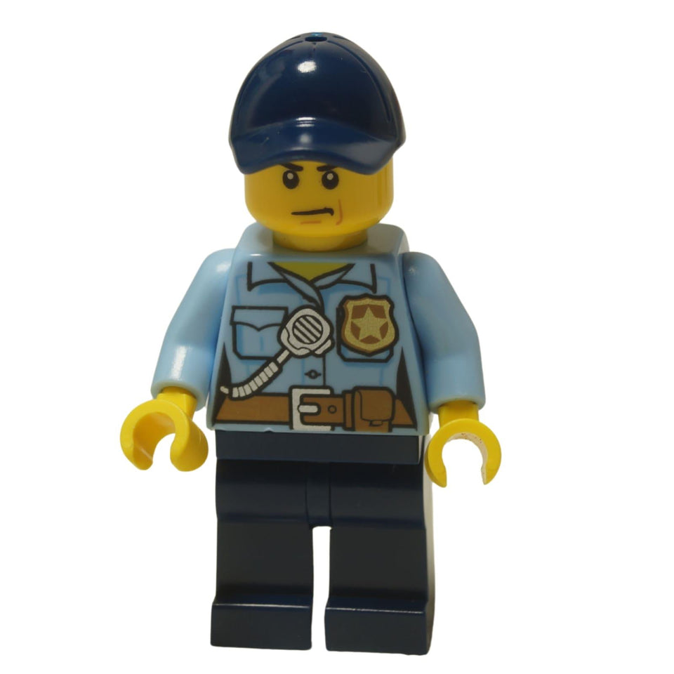  LEGO® City Police Officer minifigure (cty0616) wearing a light blue jacket and dark blue cap, with a determined expression and a scar on his cheek.