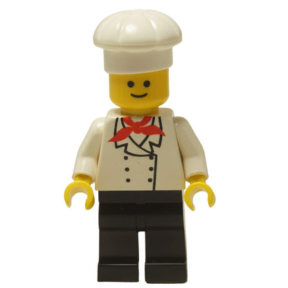 LEGO® Klasická minifigurka kuchaře (chef002) s typickým úsměvem, oblečená v bílém uniformě s černými nohavicemi a vysokou kuchařskou čepicí.