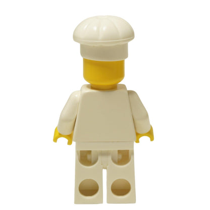 LEGO® Classic Chef minifigure (chef001) with a standard grin, wearing his white uniform and tall chef's hat. Back view.