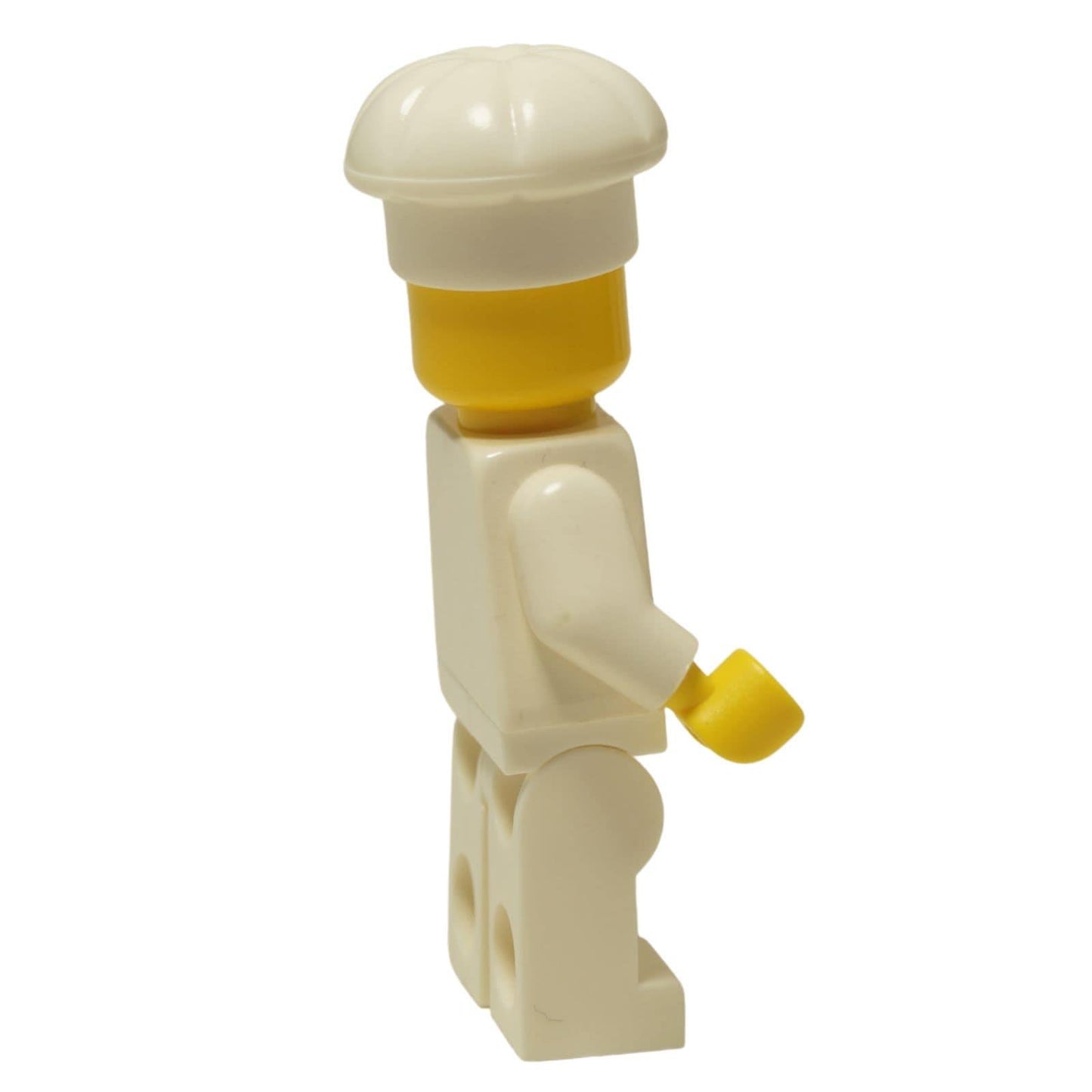 LEGO® Classic Chef minifigure (chef001) with a standard grin, wearing his white uniform and tall chef's hat. Side view.
