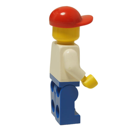 LEGO® Classic Ice Cream Vendor minifigure (chef012) with a standard grin, wearing a chef's uniform and a red cap. Side view.