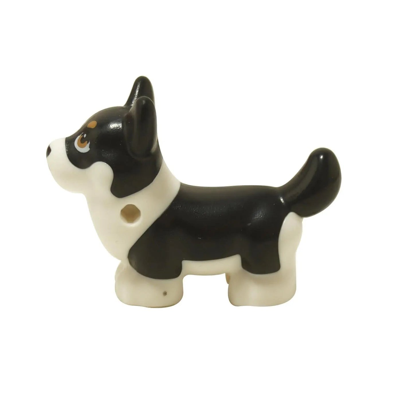 LEGO® Figurine de chien Corgi Friends nommée Peaches en noir et blanc avec la queue relevée, vue de côté